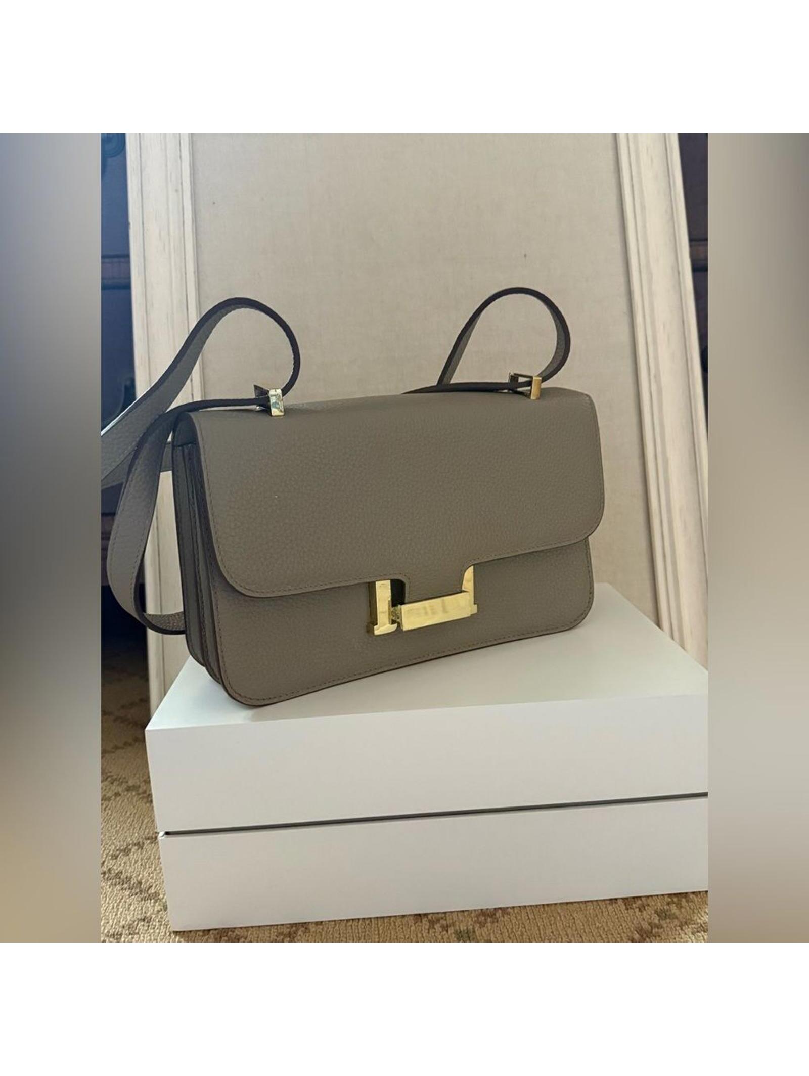 Dove Gray Togo Leather Structured Crossbody Flap Bag With Gold Hardware.